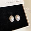 Silver Needle Zircon Oval Pearl Stud Earrings – Elegant, Niche, High-End Ear Jewelry for Women.
