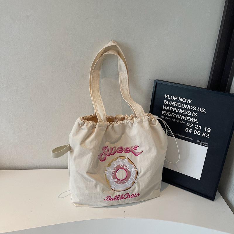 Trend fashion niche design shoulder bag women's 2025 spring new personalized lightweight portable messenger tote bag