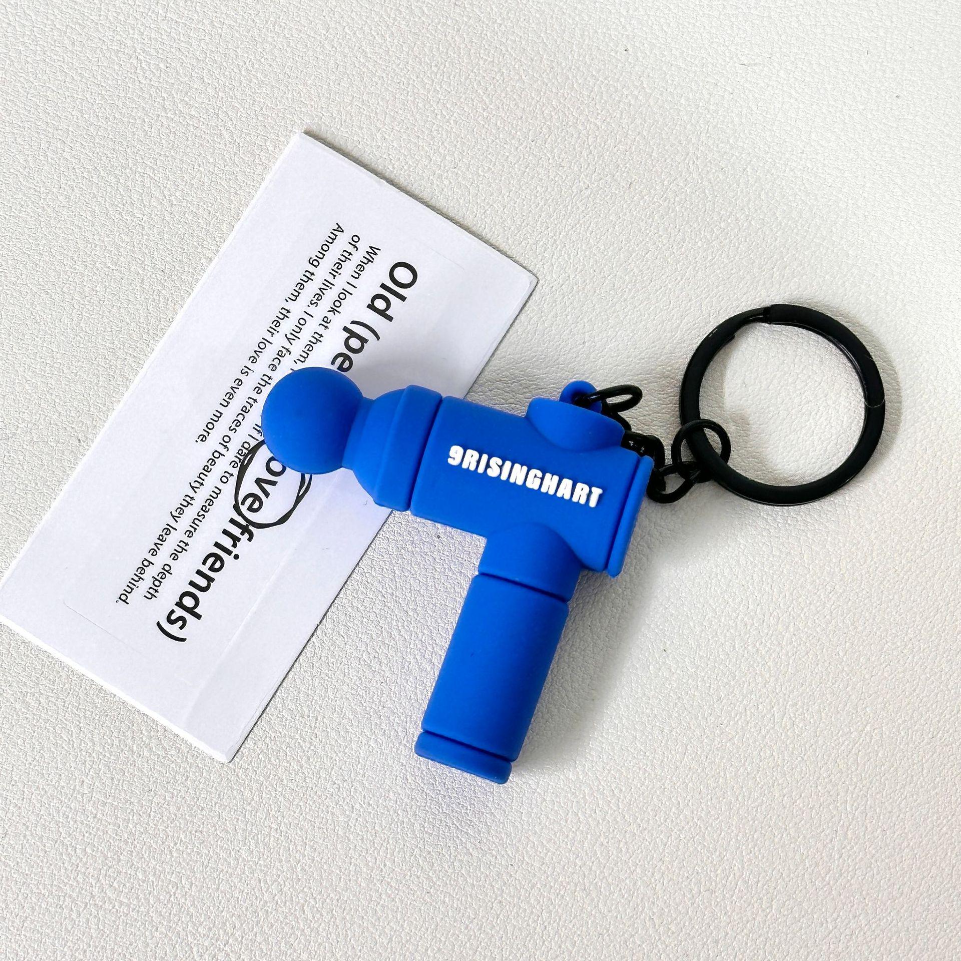 

Mini Soft Rubber Fascia Gun Keychain: Sports Fitness Backpack Pendant & Souvenir Gift