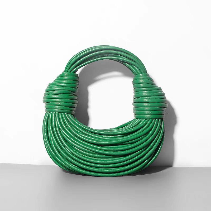 Yi Jinyuan Western-style Weaving French Circle Noodle Bag Hand-knitted Pleated Texture Niche Hand-carried Women's All-match Bag.