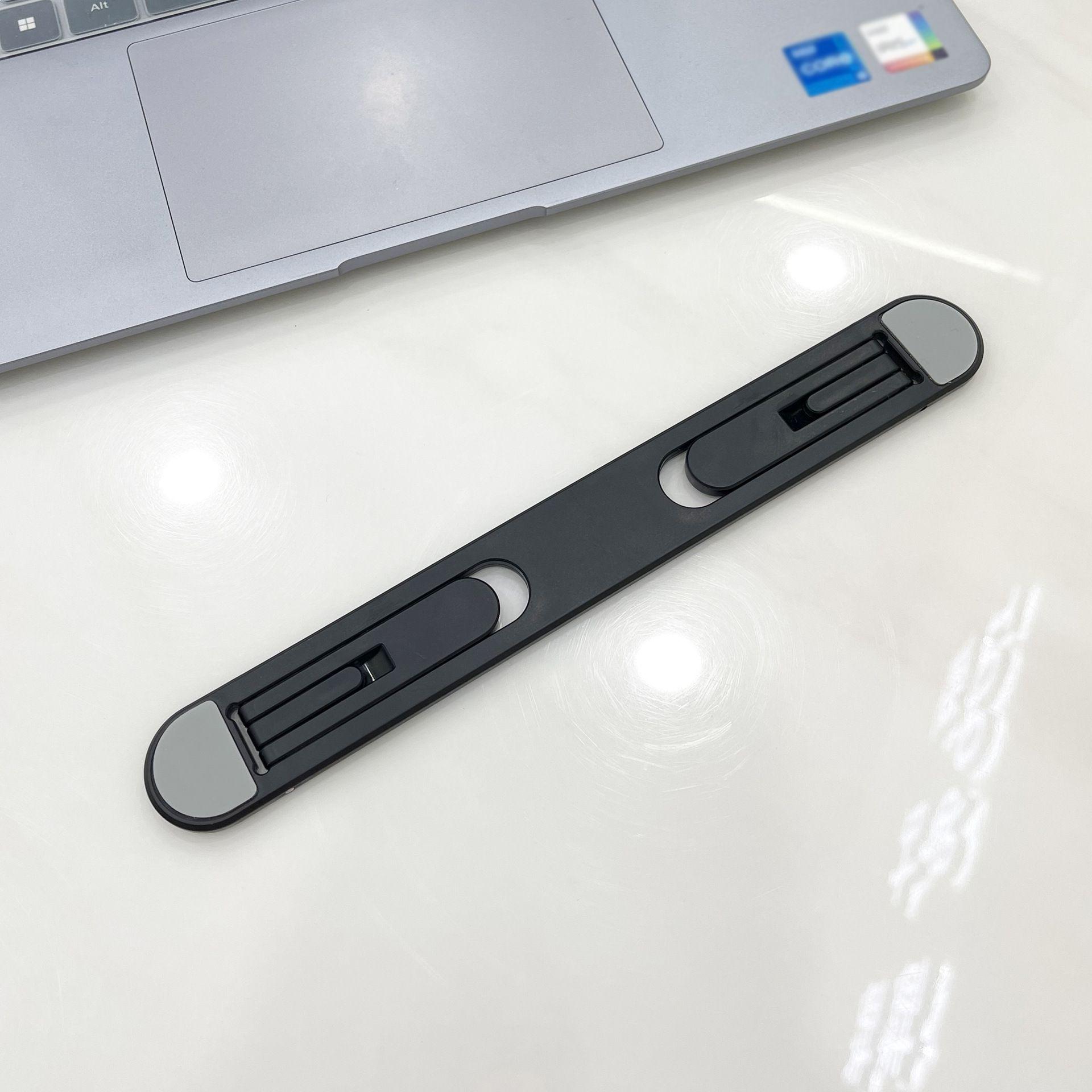 Portable Notebook Cooling Stand with Adjustable Height and Foldable Design