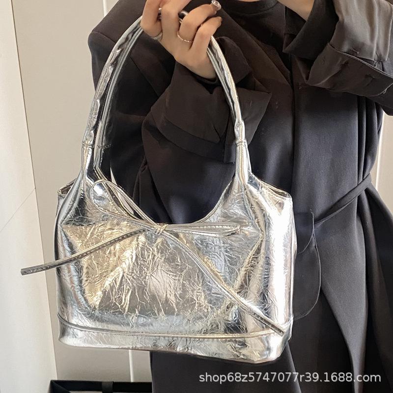 Bow niche portable bucket bag women's 2025 new trendy fashion simple commuter casual shoulder bag