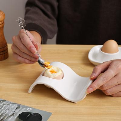 Europäische Eierablage aus Keramik, kreativer Eierbecher, weiße Eierwerkzeuge aus Keramik, einfache Küchenutensilien, dekorative Teller, Küchenzubehör
