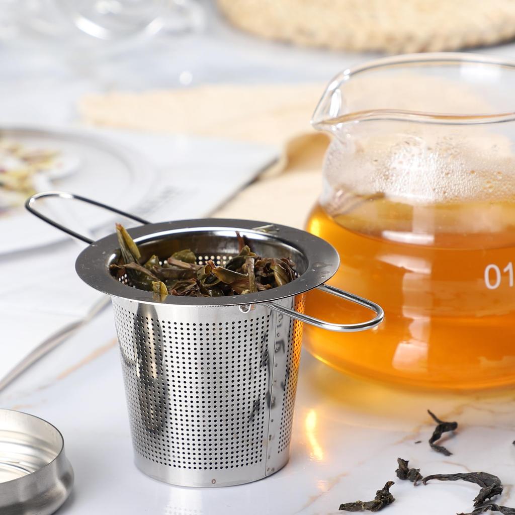 Stainless steel tea strainer with lid and teaspoon, foldable handle design