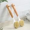A Long-handled Brush with A Handle for Washing Dishes and POTS, Which Does Not Stick To Oil or Dirty Hands. It Is A Kitchen Cleaning Tool