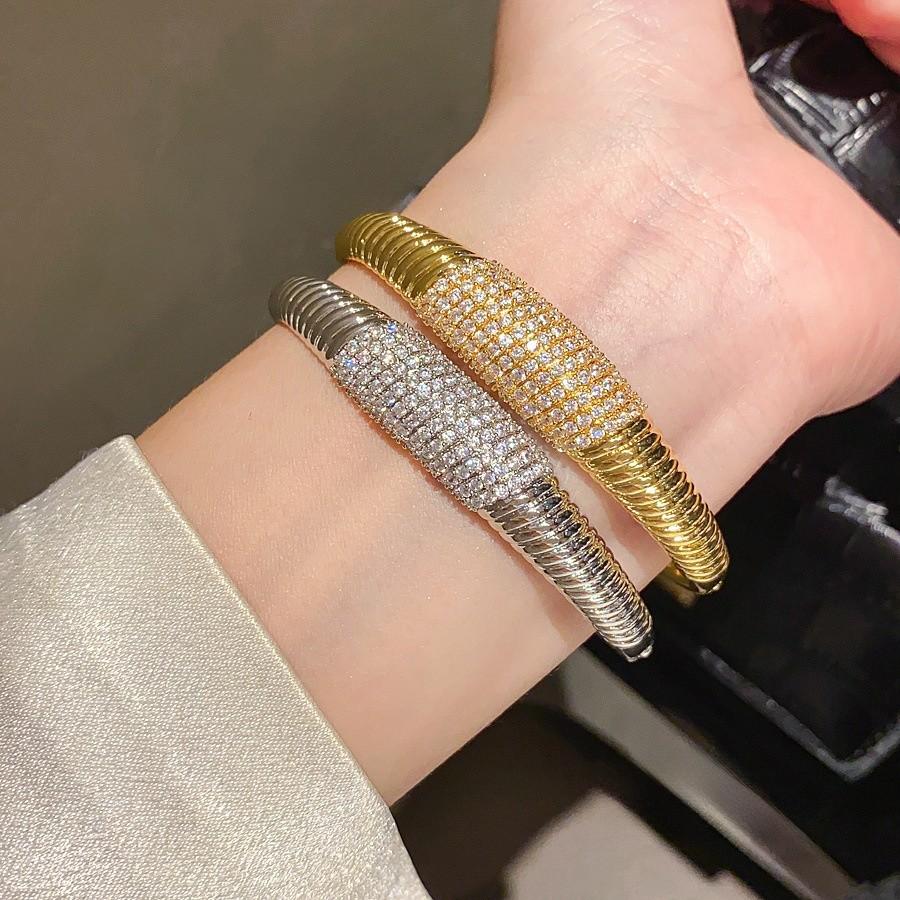 Elegant Striped Oval Bangle Bracelet With Gold Plating For Fashionable Women