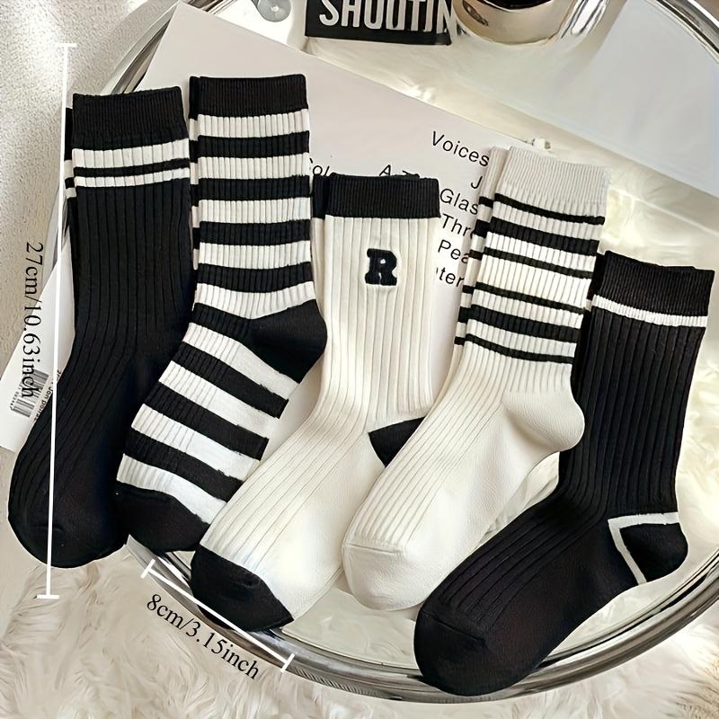 5 pairs of fashionable black and white mid tube socks, unisex, with black and white striped design