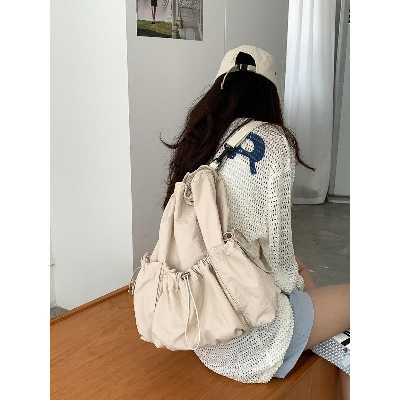 Versatile Backpack Large Capacity Pleated Commuter Schoolbag Female High School Simple Casual Nylon Drawstring Backpack