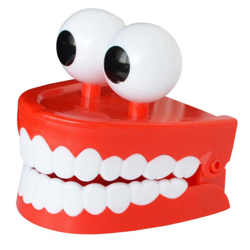 Buy LED Light Clockwork Teeth Funny Toy at affordable prices — free ...