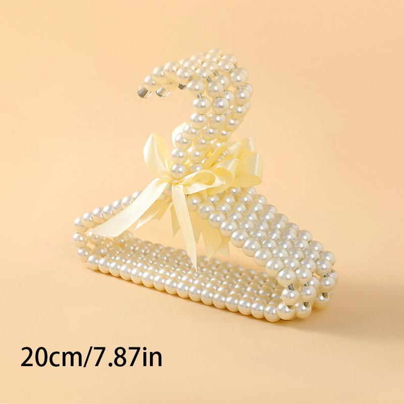 

1/5 шт. Пластиковые вешалки для одежды с жемчужными бусинами и бантом, органайзер для хранения одежды, вешалки для платьев, пальто, свадебные вешалки для детей и домашних животных 1pcs