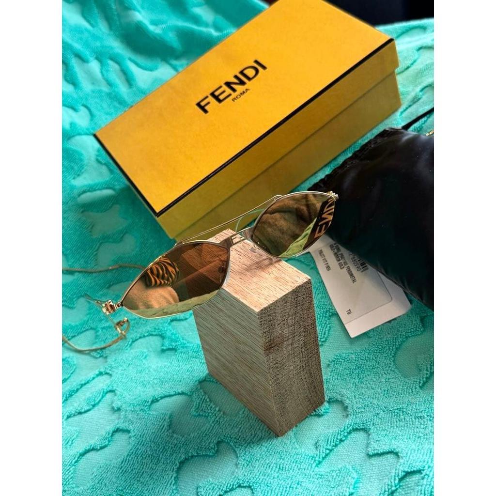 Used FENDI sunglasses with chain gold