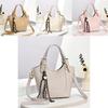 Delightful Cream Colored Handheld Bag For Women With Sturdy Shoulder Strap Perfect For Spring Adventures