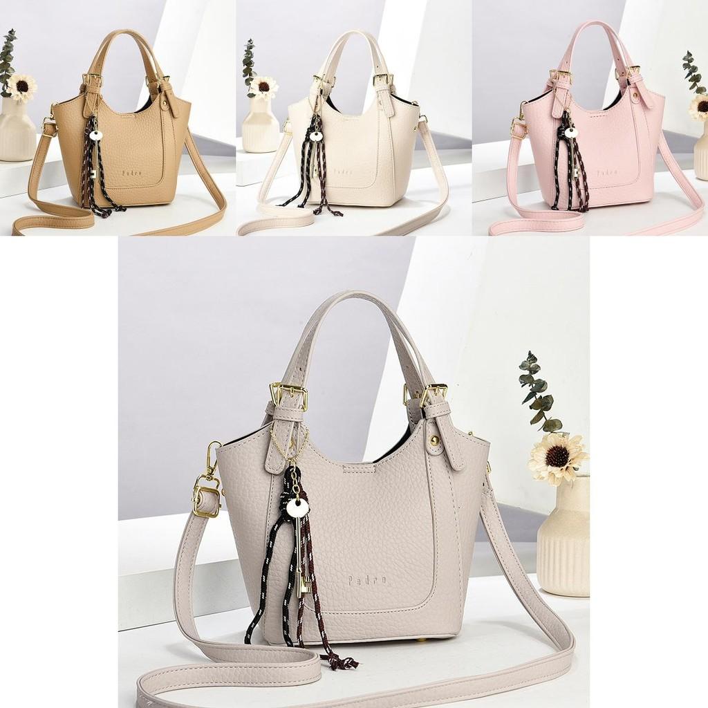 Delightful Cream Colored Handheld Bag For Women With Sturdy Shoulder Strap Perfect For Spring Adventures