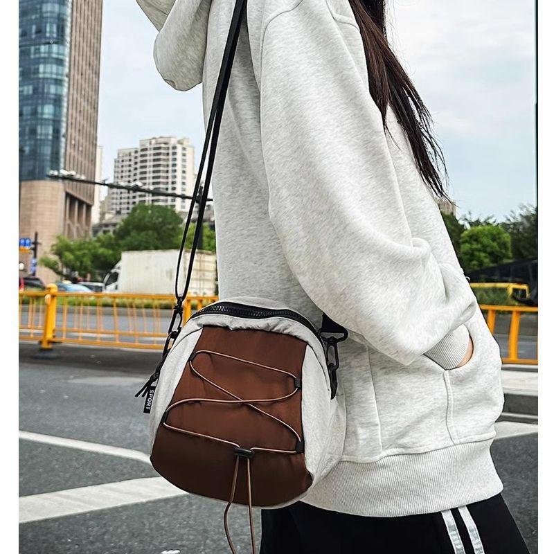 Crossbody bag women's contrasting color small bag ins trendy brand men's cross rope knot shell bag commuting versatile lightweight shoulder bag