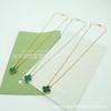 Four-Leaf Clover Pendant Necklace with Mother-of-Pearl and Agate On a Double-Sided Clavicle Chain