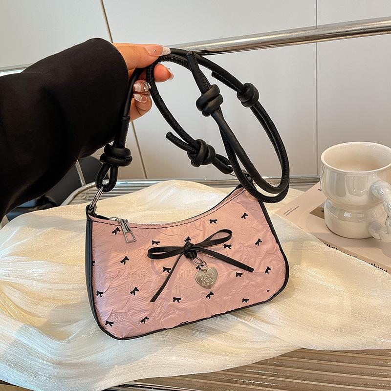 

Korean sweet seersucker bow underarm bag women s high-end black pink contrasting color shoulder messenger bag commuter bag