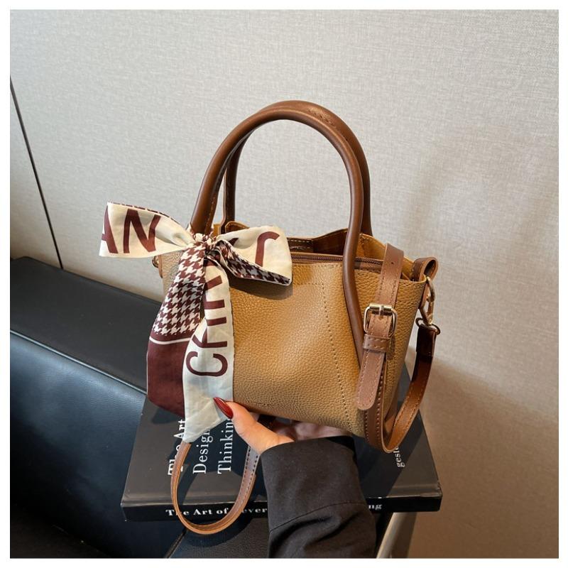 

New retro simple hand bucket bag women s spring and summer trend niche shoulder bag casual women s bag коричневый