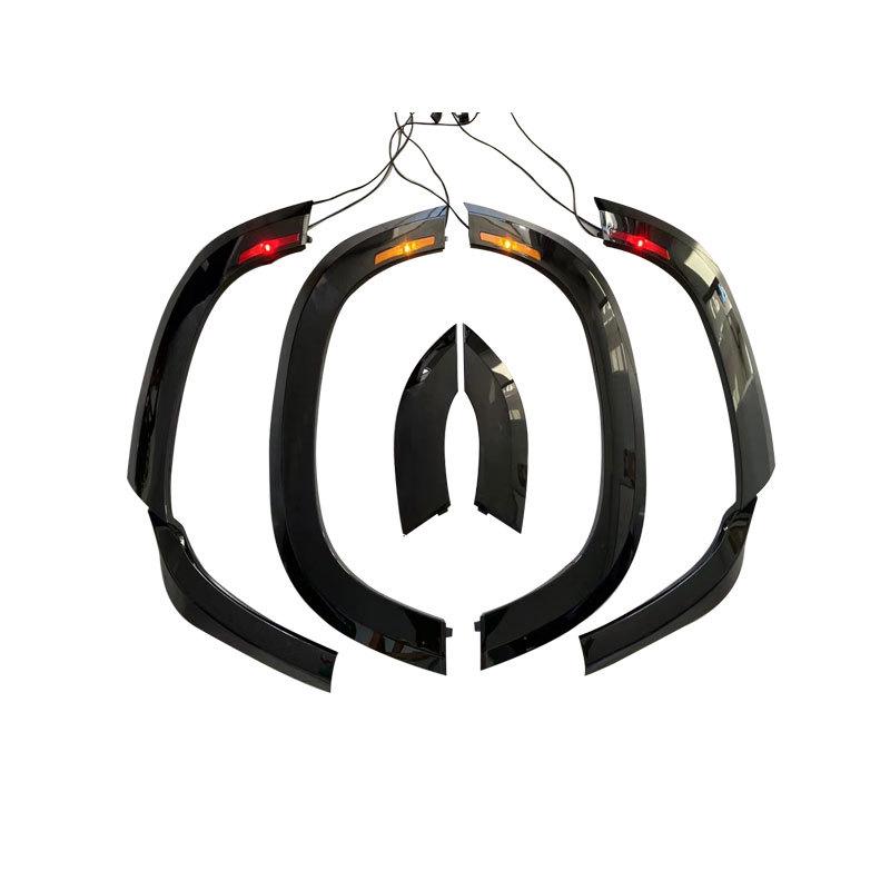 Bright Black Wheel Arches with Lights for Defender 110 - Black Warrior Upgrade