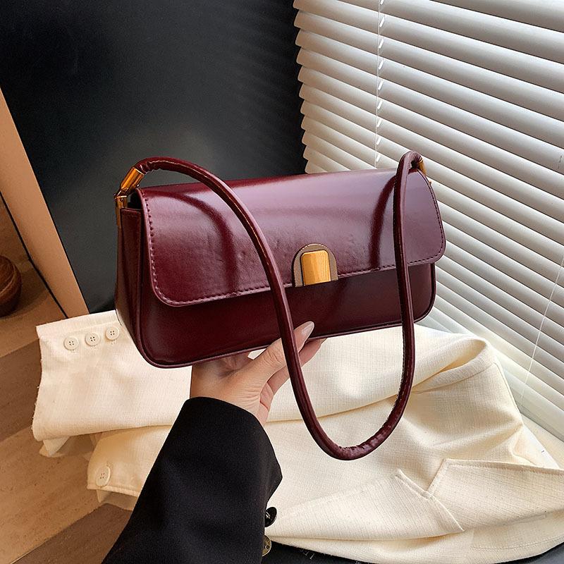 

Сумка премиум-класса, простая, женская, 2025 новая, ретро, универсальная, на плечо, подмышку, модная сумка-багет красный