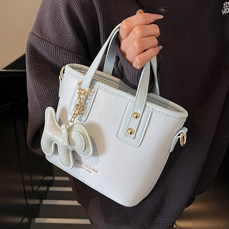 2025 fashion trend high sense niche design contrasting colors portable bucket bag versatile commuter temperament messenger bag woman