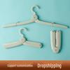 Compact Multi-Functional Travel Clothes Hanger - Portable and Foldable for Business Trips and Dorms