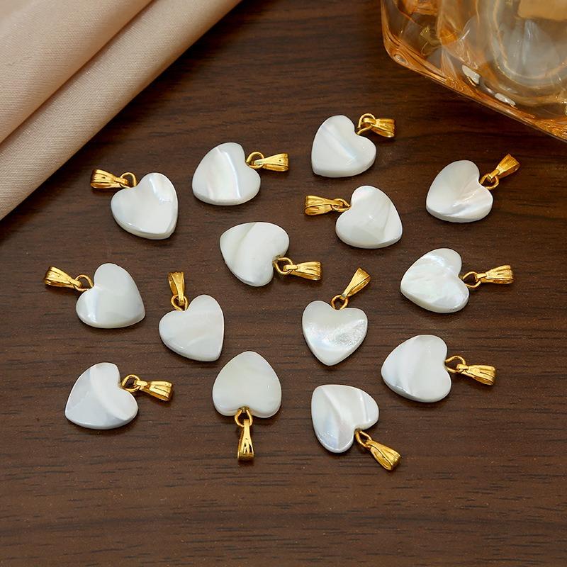 DIY jewelry accessories, hot-selling new accessories, horseshoe snail heart pendant, bracelet necklace.