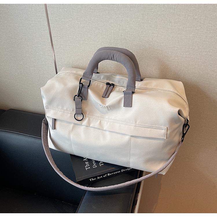 Dámská cestovní a sportovní taška s velkou kapacitou - Módní úložná taška na krátké výlety