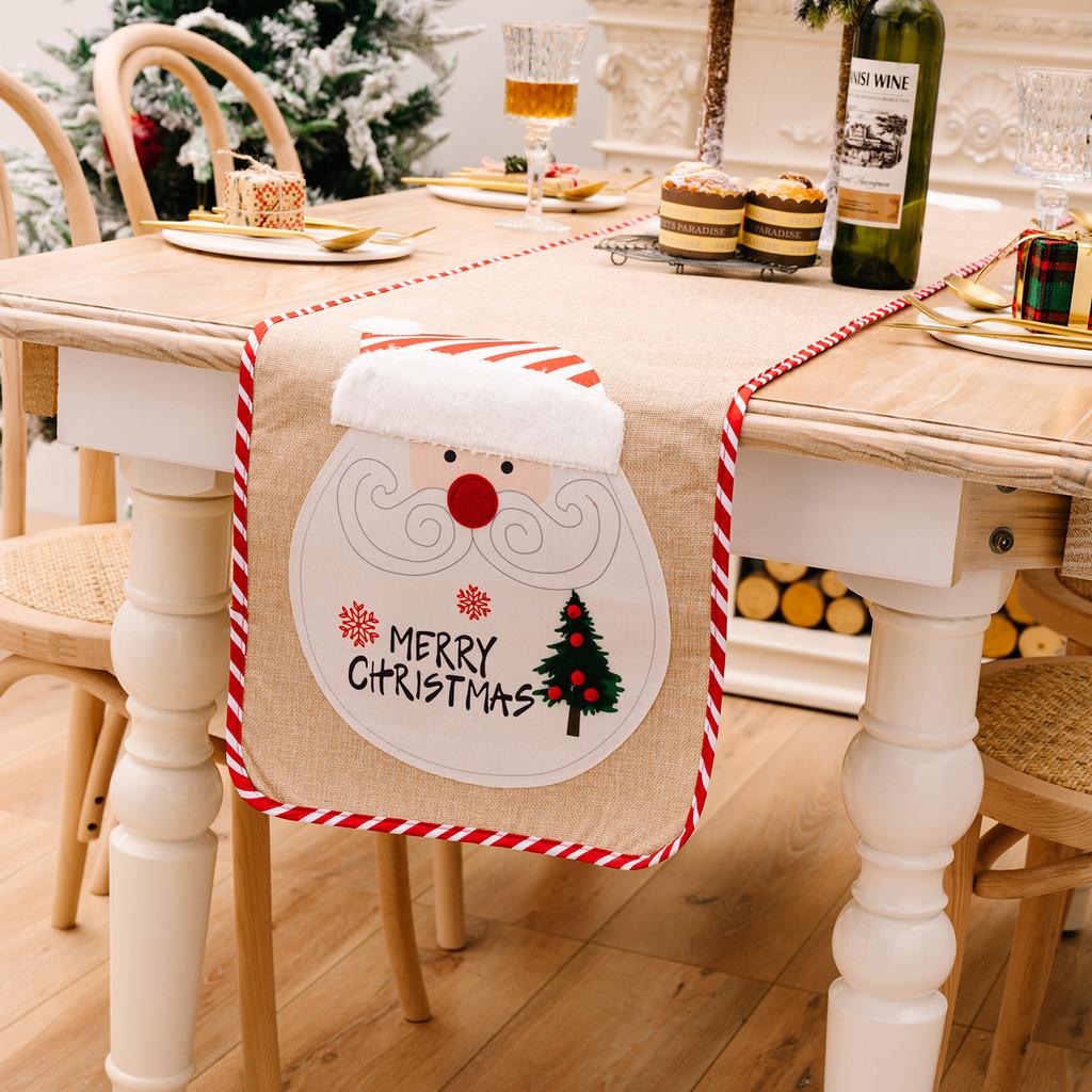 Charming Burlap Christmas Table Decor With Striped Edges Adorned With Whimsical Snowman And Characters Santa