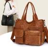Moda vintage gran capacidad multi-espacio bolsa de maternidad 2026 cuero suave versátil bandolera de hombro para el día a día bolso tote