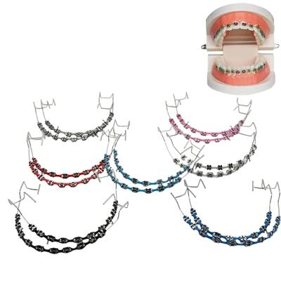 1 Paar Bunte Brackets Zahnspangen-Imitat mit Haken Temporäre Zahndekoration mit Metalldrähten Bracket-Ligaturdraht mit Box