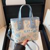 Fashionable and Trendy Printed Shoulder Bag for Women's New Simple Hand To Wear Tote Bag for College Students' Commuting Class Bag