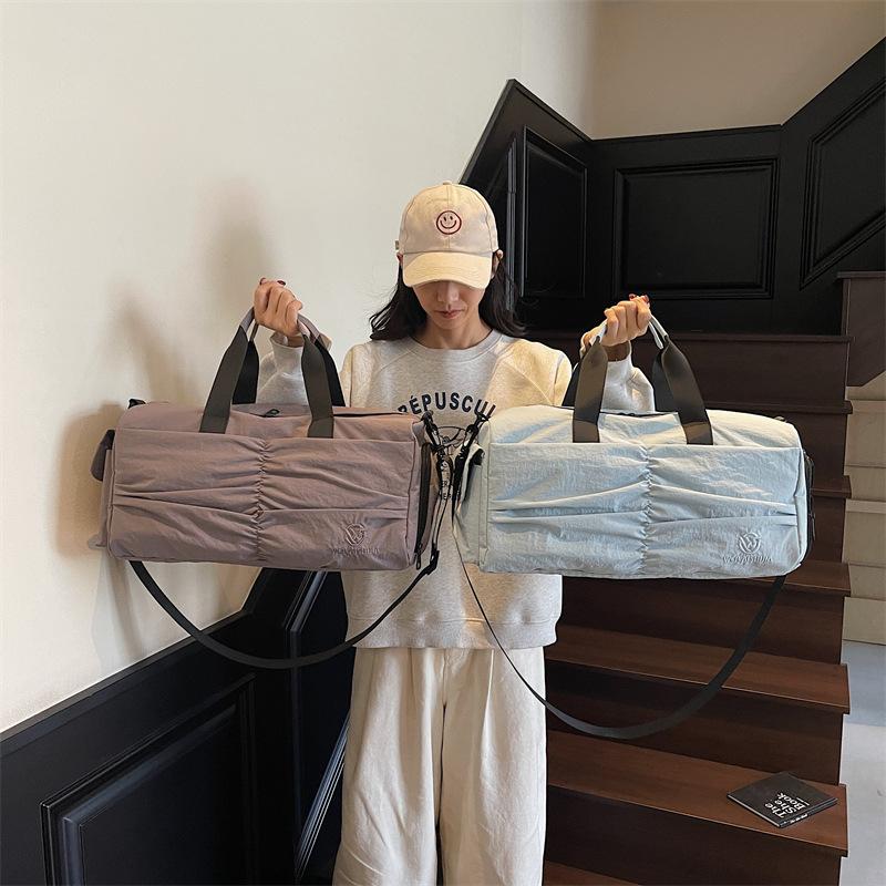 Large-capacity travel bag, new model with dry and wet separation, pleated storage bag, independent shoe compartment, travel sports and fitness bag