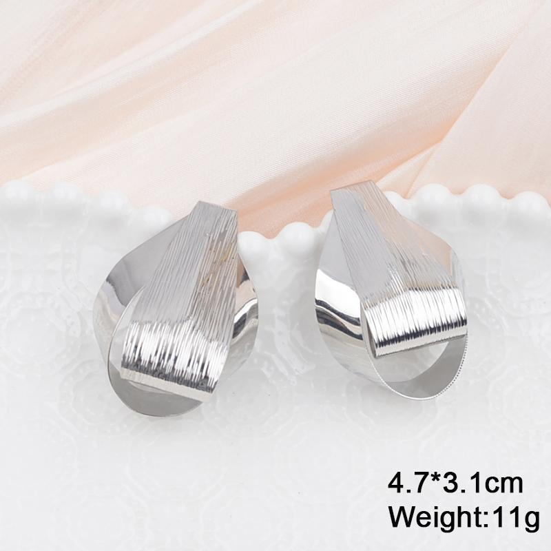 Boucles d'oreilles pendantes torsadées en métal pour femmes, couleur or, alliage enveloppé, déclaration géométrique irrégulière, oreille féminine, zircon, pendientes mujer