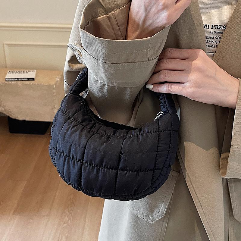 Korean niche fashionable pleated cloud bag female foreign style solid color personalized hand carry cotton clothes bag