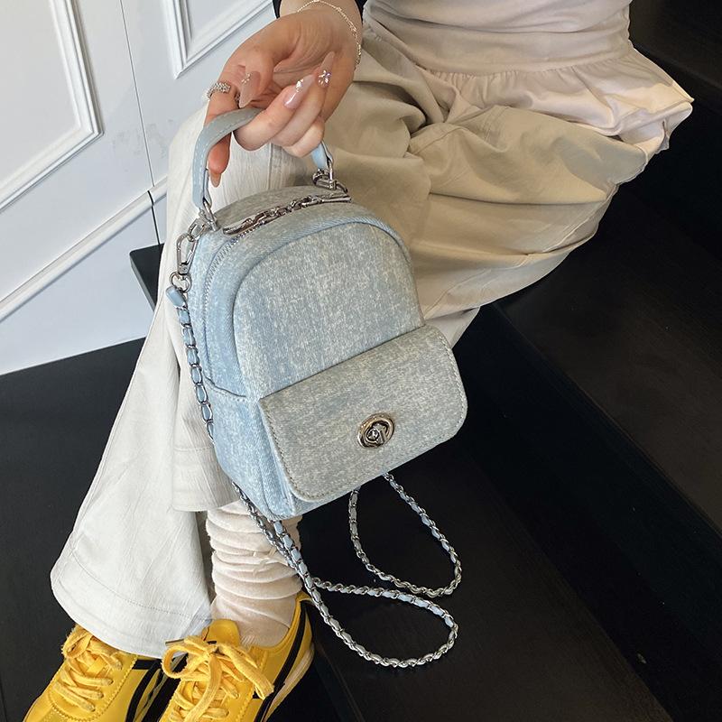 New denim blue mini portable backpack women's 2025 spring and summer chain simple contrasting color lock fashionable small backpack