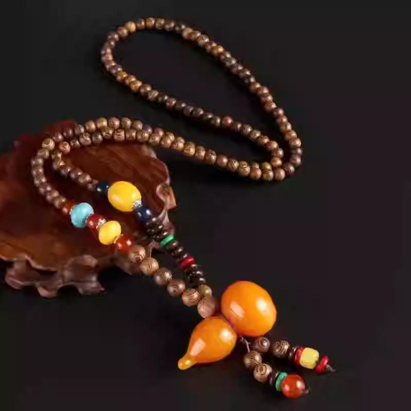 Trendy Unisex Wooden Bead Necklace: Versatile, High-End Pendant for Sweater Chains and Cotton Linen Attire