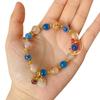 Women's Bracelet: Blue Agate Heart, Gold Foil, Ping An Kou Flower, Porcelain Glaze, Half Sugar Design.