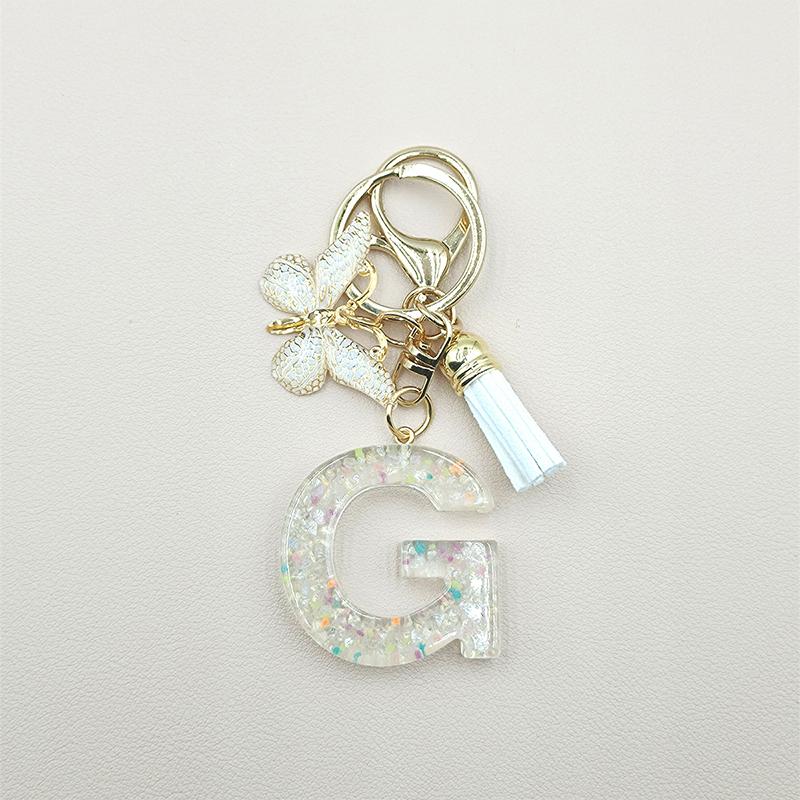 

Изысканный светящийся брелок с буквами, симпатичная бабочка, кисточки, брелок, кулон, украшение для рюкзака, аксессуары, подарки G