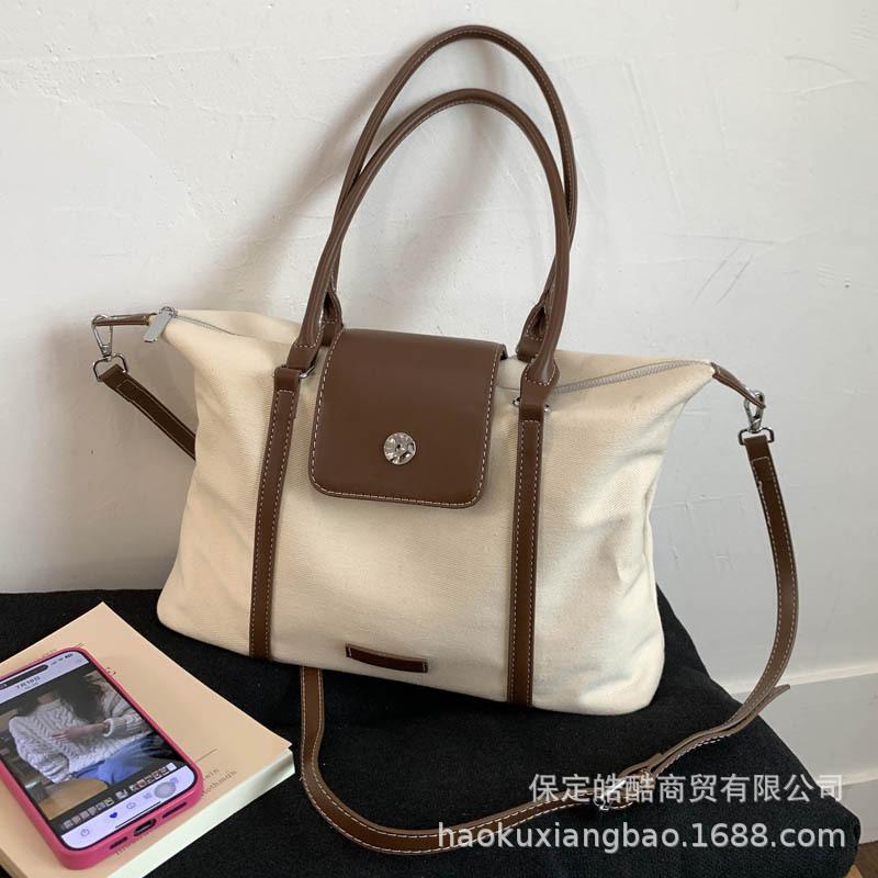 Canvas bag women's large capacity 2025 new autumn and winter versatile simple shoulder messenger bag college student class tote bag