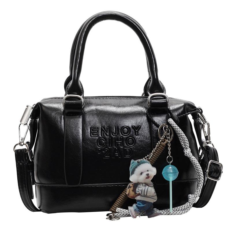 Korean Version of the New High-end College Temperament Portable Pillow Bag Women's Leisure Commuting Versatile Messenger Boston Bag