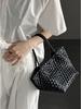 Niche Handmade Woven Dumpling Bag: 2025 High-End Drawstring Handbag & Mother-Child Market Bag