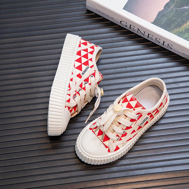 2025 medium and older children's sports shoes boys' bottom anti-new children's canvas shoes girls' casual shoes biscuits skateboard shoes