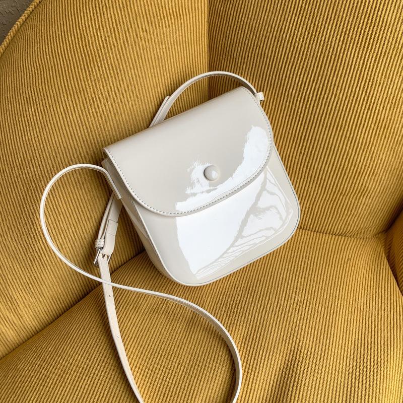 

Bag women s new niche simple fashion summer versatile saddle bag casual messenger bag білий