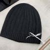 Rabbit fur knitted hat women's autumn and winter bow decoration sweet thermal hat outdoor headgear