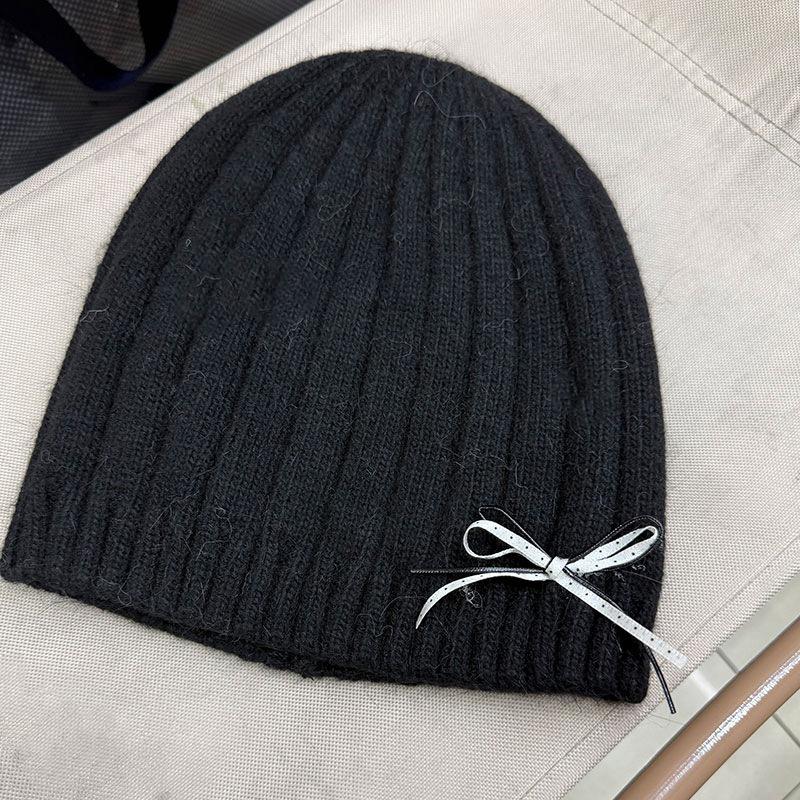 Rabbit fur knitted hat women's autumn and winter bow decoration sweet thermal hat outdoor headgear