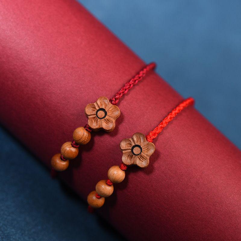 Bracelet Porte-Bonheur en Bois de Pêcher Cordon Rouge Paix pour Tous les Âges