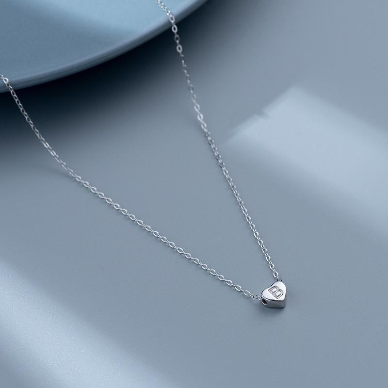 S925 Silver Heart-Shaped Initial Necklace - Korean Style Clavicle Chain with Trendy Peach Heart Design.