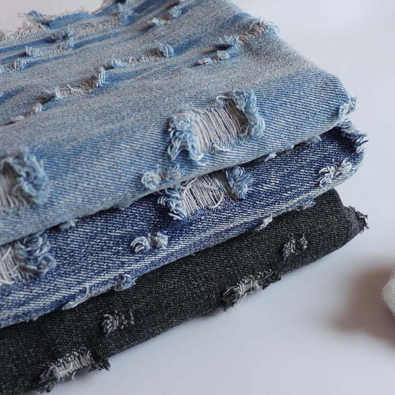 Vintage-Blue-Jeansstoff mit gebrochenen Löchern zum Nähen von Hosen, Jacken, Blazern, modischer Denim-Stoff zum Selbernähen von Kleidungsstücken
