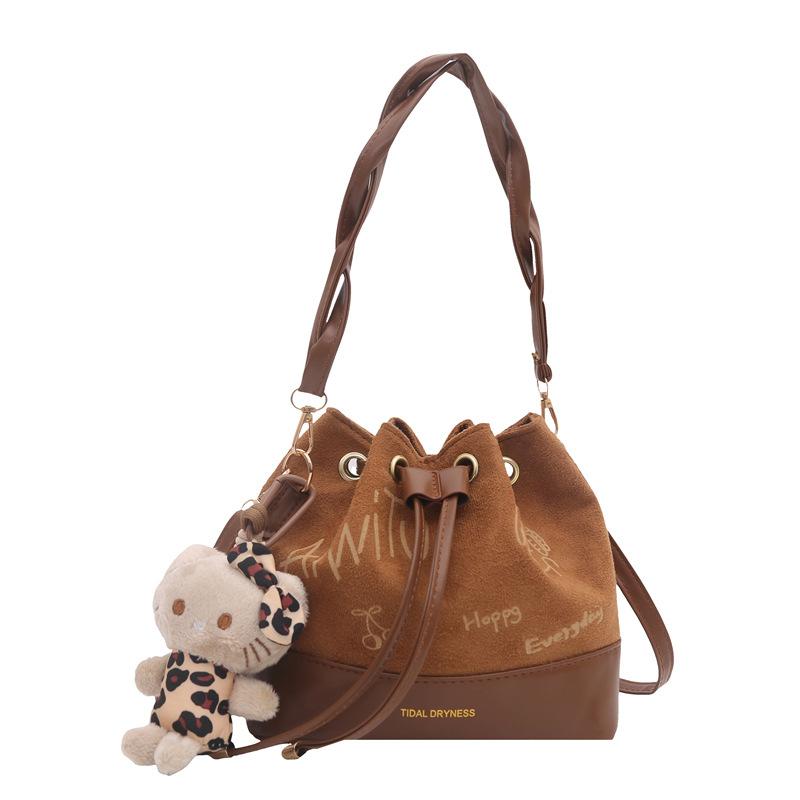 

Textured portable bucket bag women s autumn and winter new suede fleece daily commuter shoulder bag vintage crossbody bag No pendant model коричневий