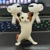 Charming Cat Pen Holder: TikTok's Cute Japanese Dancing Cat with Raised Paws, Functional and Adorable, Colorful Toy.